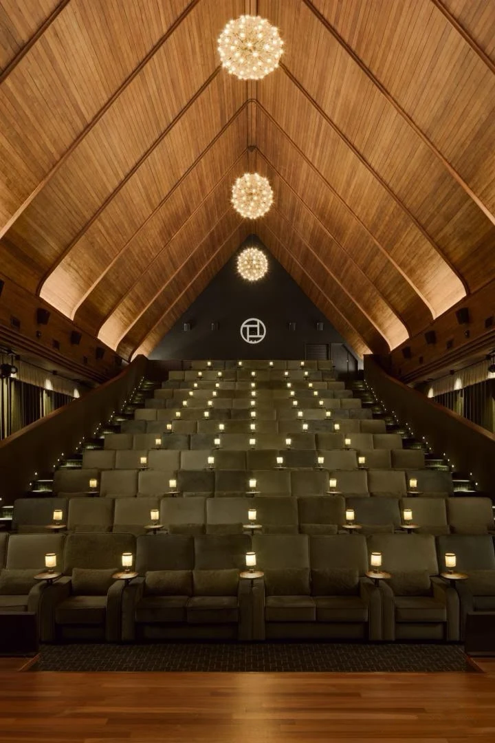 Auditorium with timber-toned walls