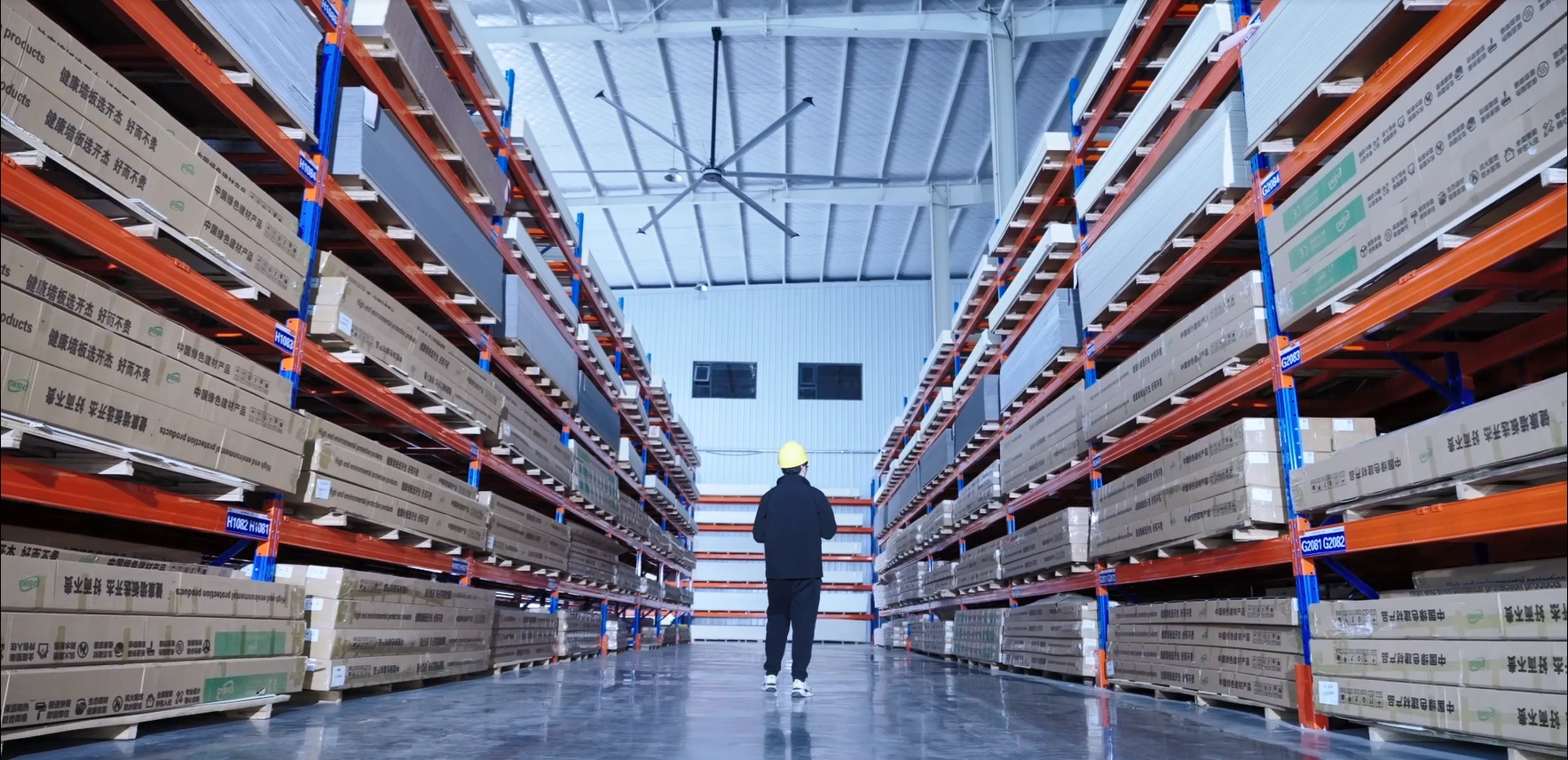 Stored panels on organised workshop racks
