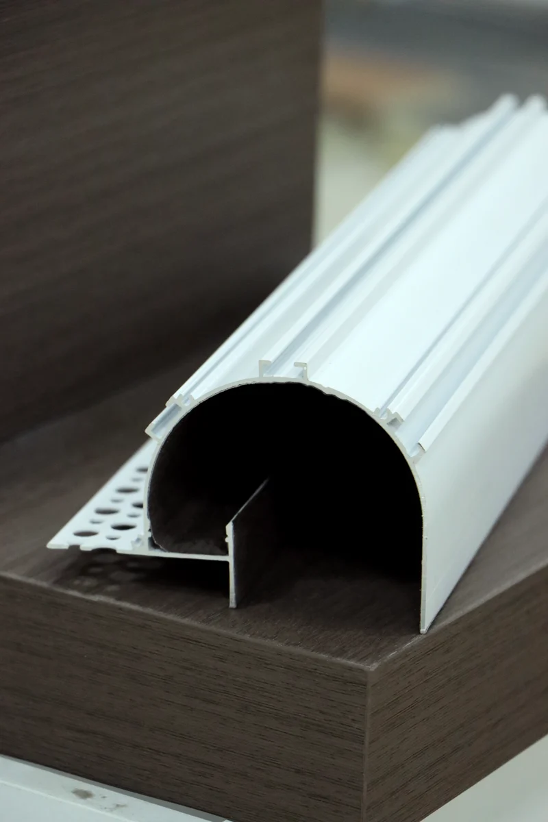 Rounded section with a perforated flange